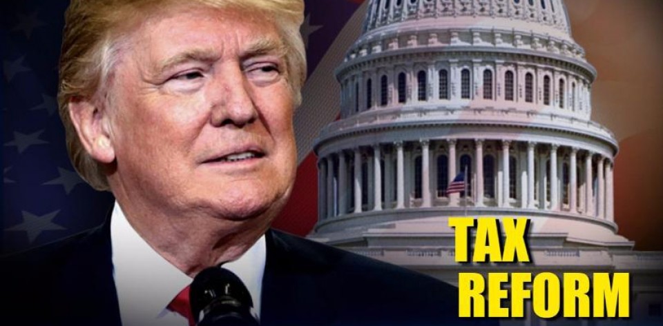 Baskan Trump Cumhuriyetçi vergi yasasını imzaladi